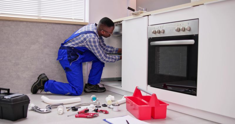 Local Kitchen Drain Leak Repair pros at work